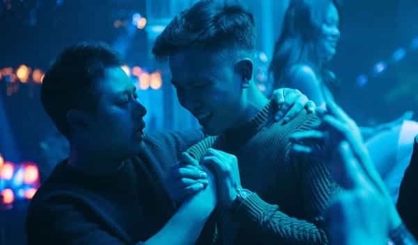 Two teenage boys have a 'Bro' moment