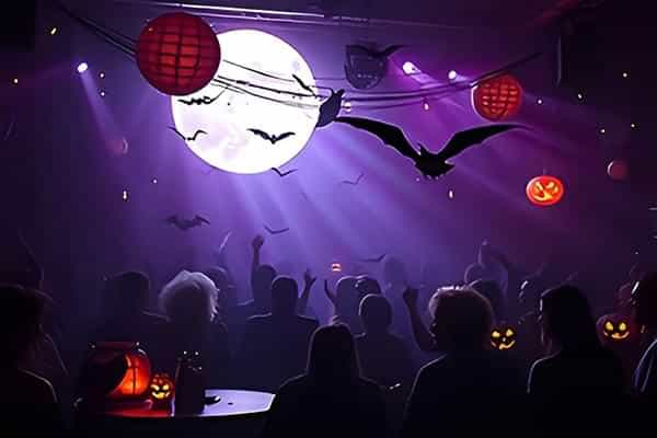 Themed Halloween disco with vibrant lights and decorations